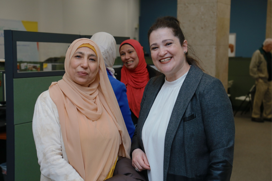 Two woman smiling