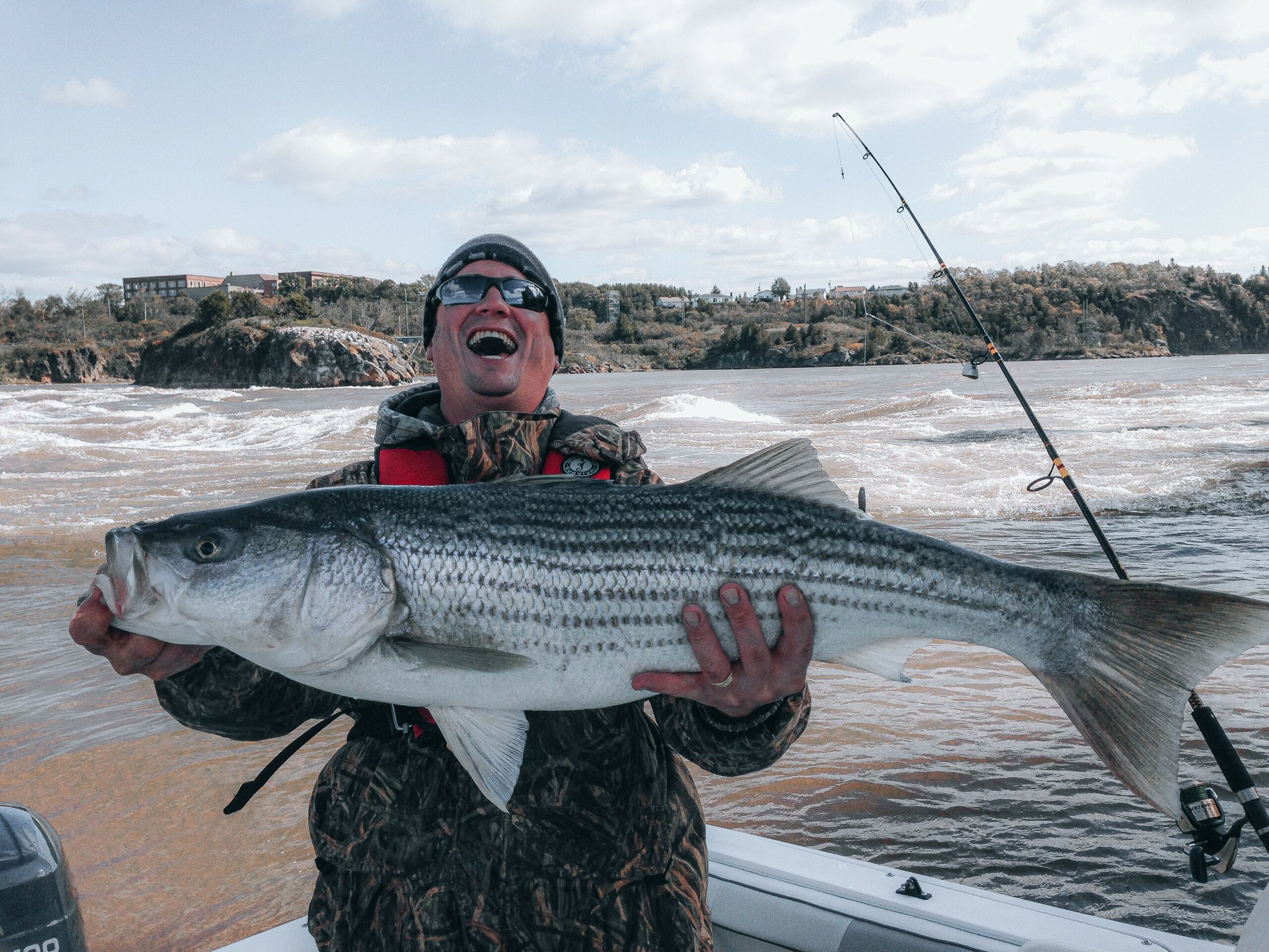man smiling with big fish