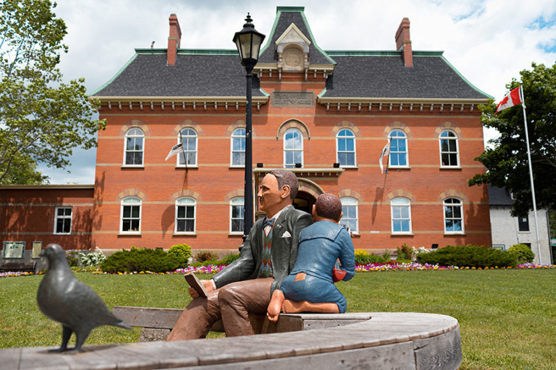 Brown building with statue