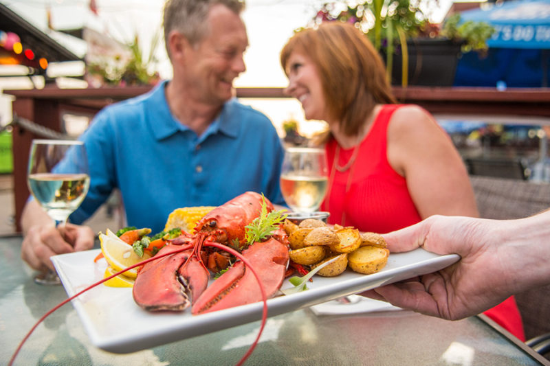 People eating lobster