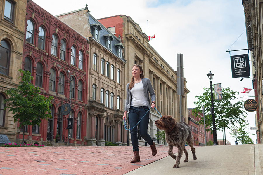 Woman walking her dog