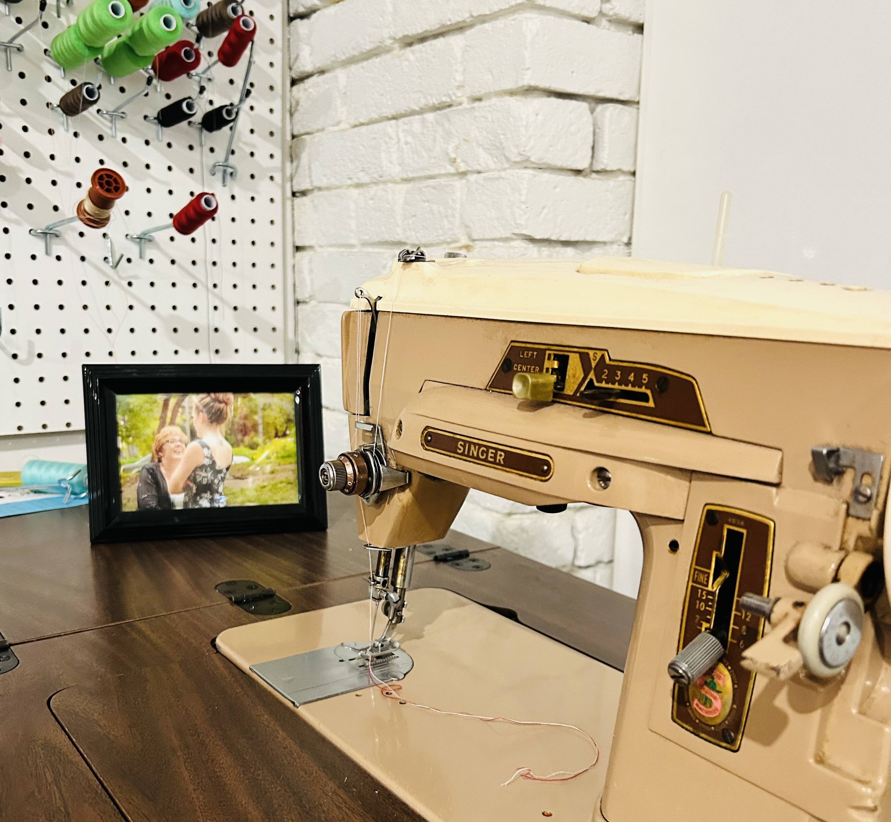 sewing machine and photo of mother and daughter