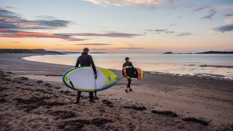 surfers in NB